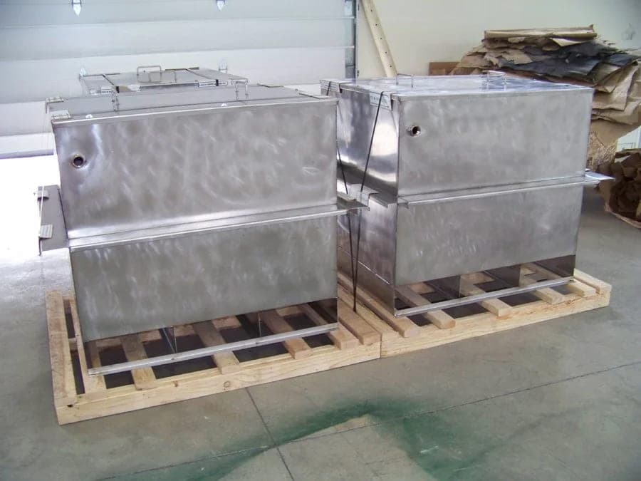 Two rectangular stainless steel non-pressure tanks with removable lids, crated on pallets